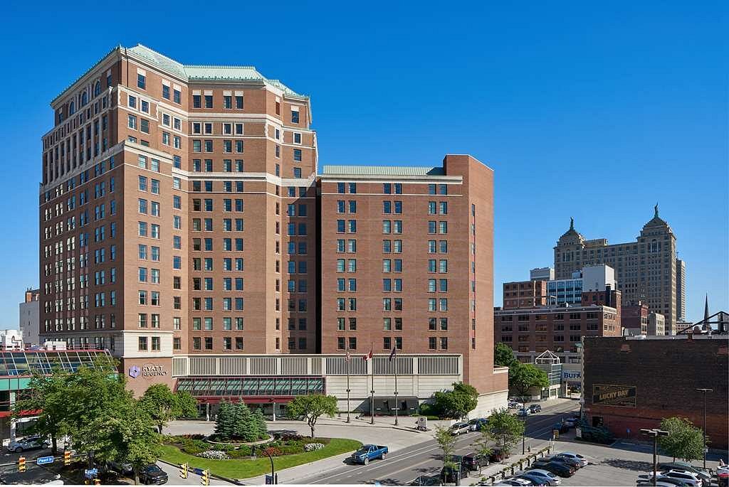 A street view looking up at the Hyatt Regency Buffalo Hotel in Buffalo, New York, a location of FamilyLife's Weekend to Remember® marriage retreat event