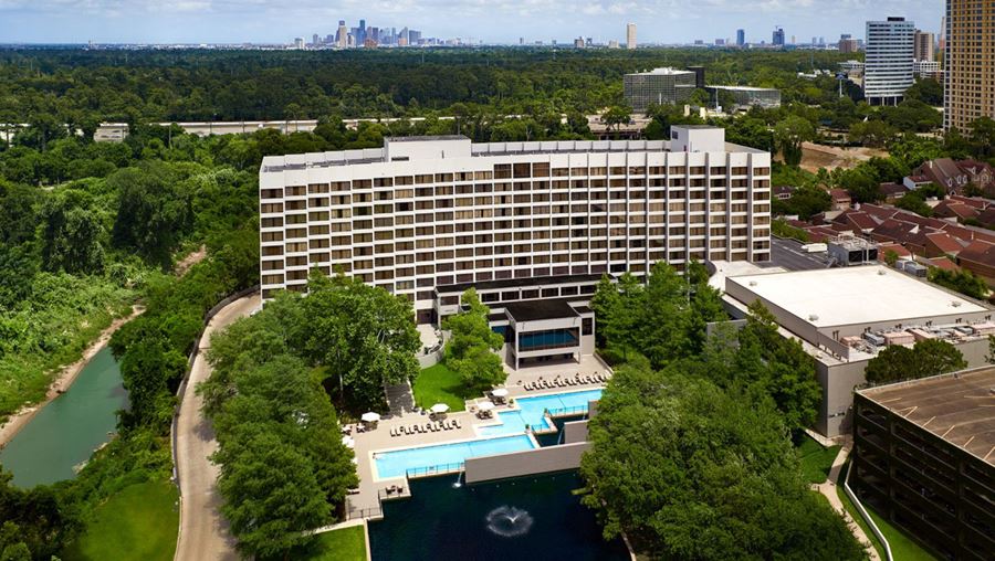 With the city skyline in the background, see an aerial view of the Omni Houston hotel in Houston, Texas, a location of FamilyLife's Weekend to Remember® marriage retreat event
