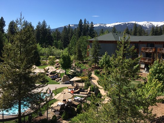 A view of the Hyatt Regency Lake Tahoe as it sits on a hillside among the beautiful trees and mountain views - a location for FamilyLife's Weekend to Remember® marriage retreat