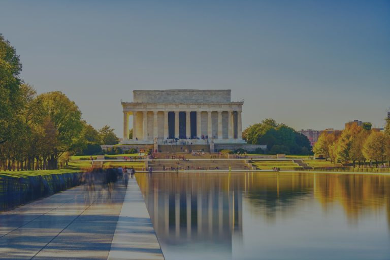 An early morning, blue sky view of America's Lincoln Memorial overlooking its iconic Reflecting Pool in Washington, D.C., near Reston, Virginia, a location of FamilyLife's Weekend to Remember® marriage retreat event.